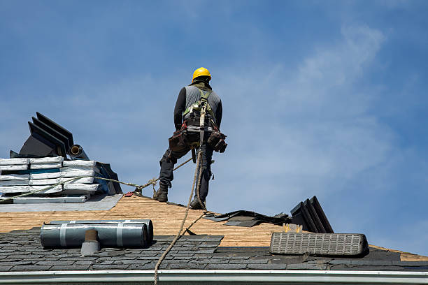 Professional Storm Damage Roof Repair technician working in Smithville, OH